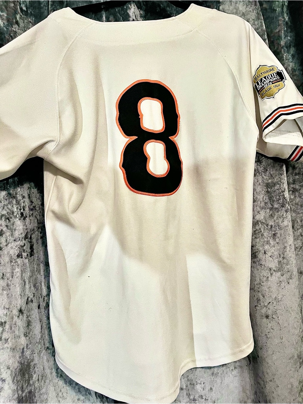 Cream Baseball Jersey with Black & Orange Number 8